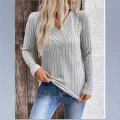 Kaitlyn striped sweater for women by Christine Brewer, featuring a cozy knit with navy and white horizontal stripes.