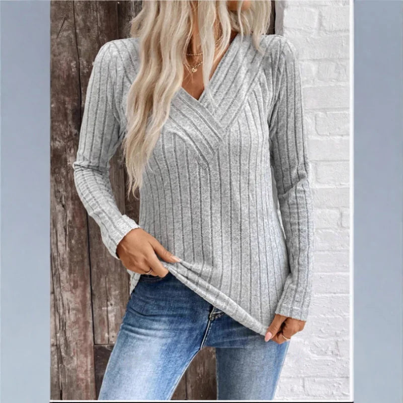 Kaitlyn striped sweater for women by Christine Brewer, featuring a cozy knit with navy and white horizontal stripes.