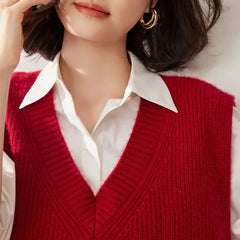 Cashmere ribbed knit sweater vest for women by Christine Brewer, featuring a stylish and cozy design in neutral tones.