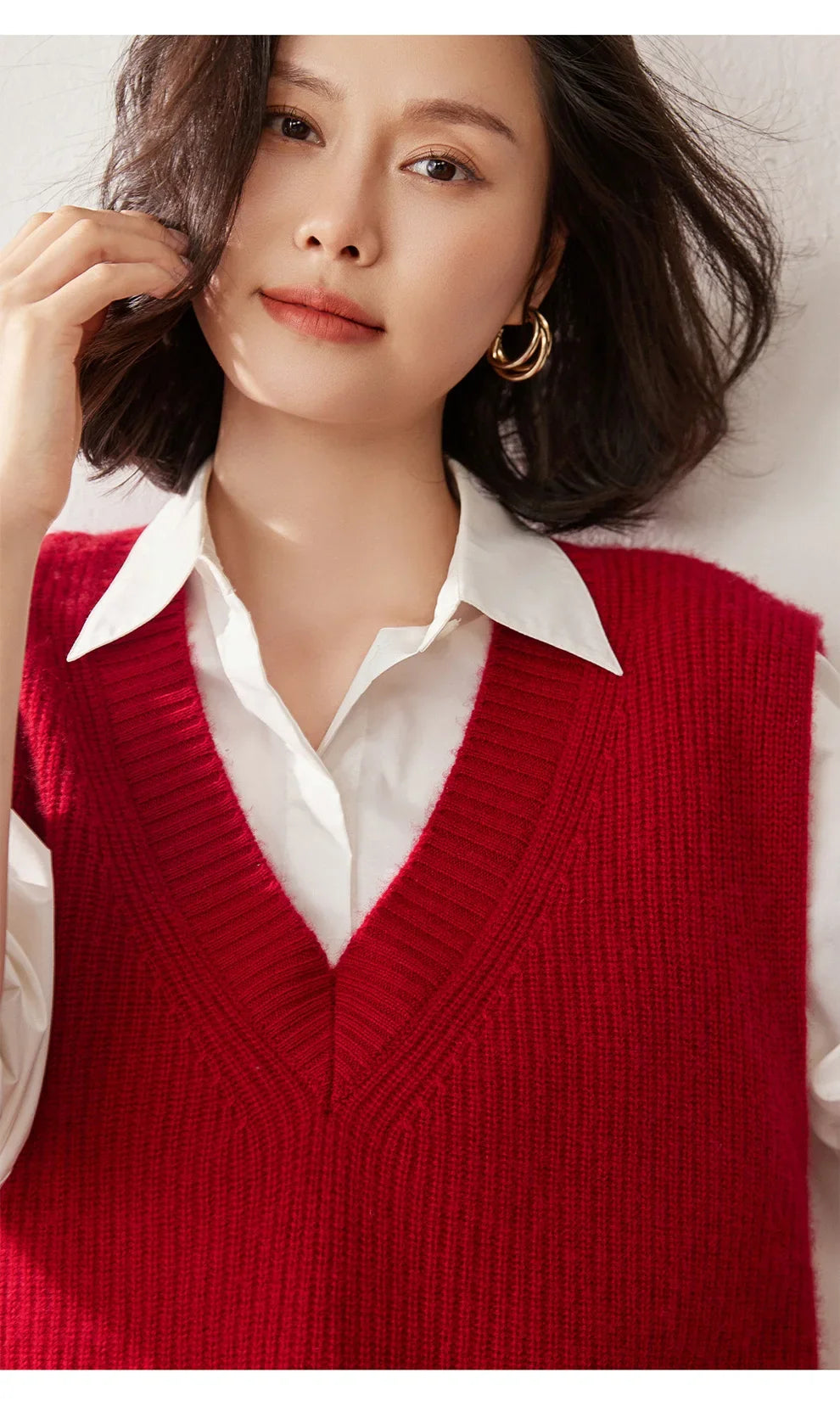 Cashmere ribbed knit sweater vest for women by Christine Brewer, featuring a stylish and cozy design in neutral tones.