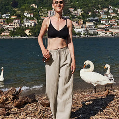 Women’s knit wide-leg drawstring trousers by Christine Brewer, loose pull-on pants in soft, comfortable fabric.