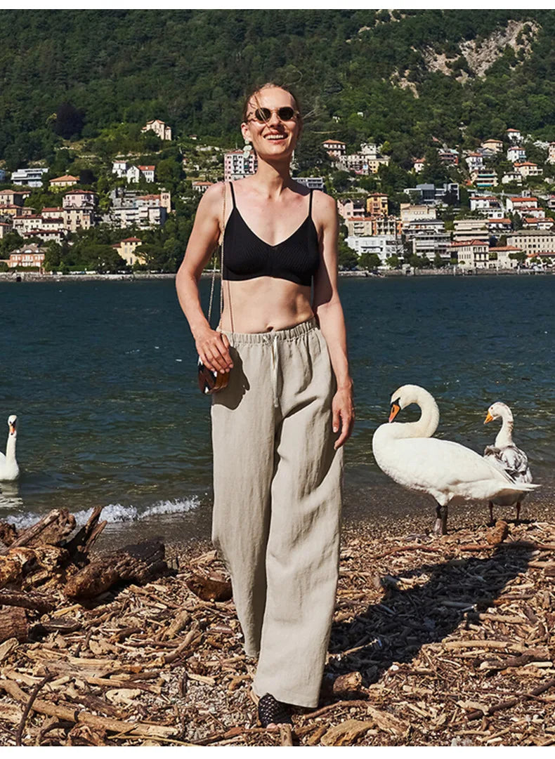Women’s knit wide-leg drawstring trousers by Christine Brewer, loose pull-on pants in soft, comfortable fabric.