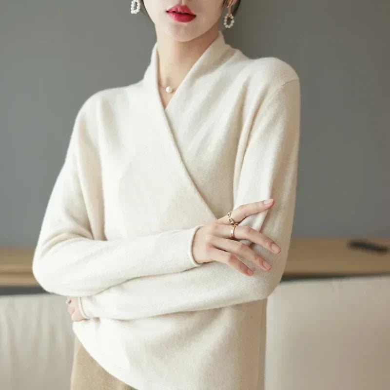 Christine Brewer Gwen cashmere V-neck sweater for women, soft beige knit with long sleeves and a relaxed fit.