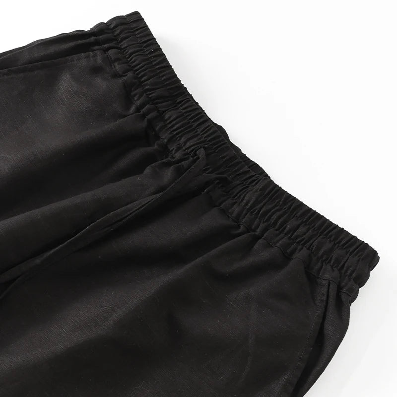 Women’s cotton linen wide leg drawstring trousers by Christine Brewer, loose pull-on pants with a relaxed fit and breathable fabric.