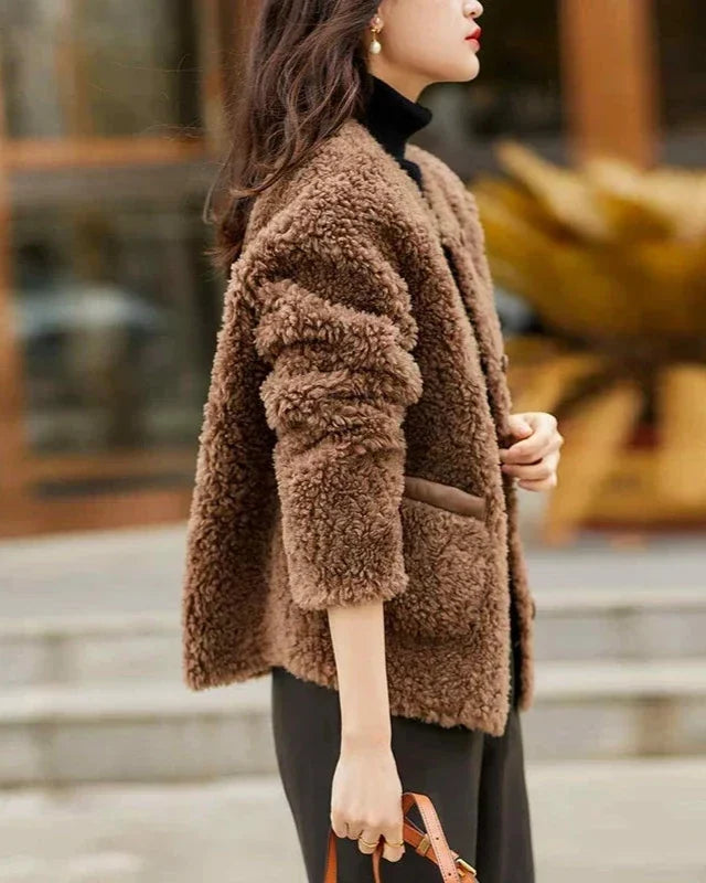 Emily glamorous faux fur coat for women by Christine Brewer, featuring soft plush fur and stylish design.