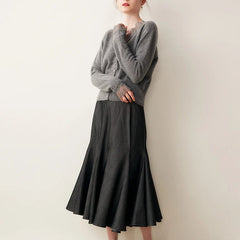 Elsa cashmere cardigan for women by Christine Brewer, soft beige knit with long sleeves and V-neck, cozy and stylish.
