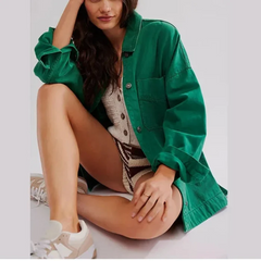 Oversized Charlotte denim shirt jacket for women by Christine Brewer, featuring a classic blue denim design and relaxed fit.