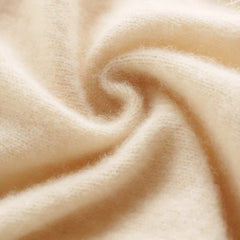 Elegant Elsa cashmere cardigan for women in soft knit, featuring a cozy fit and classic design by Christine Brewer.