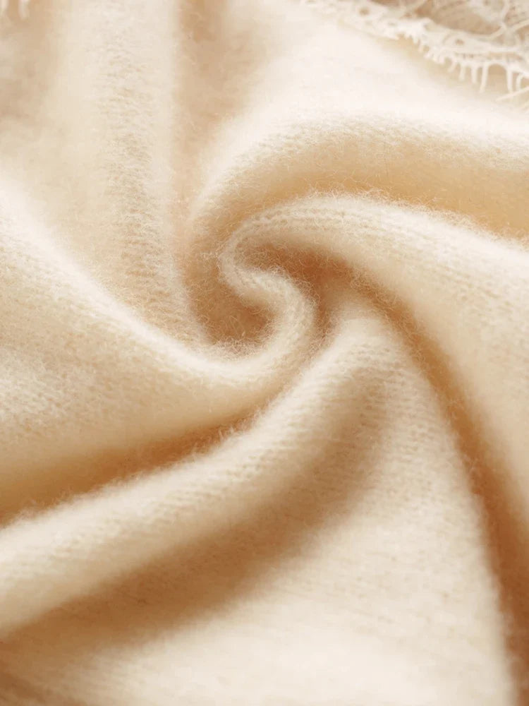 Elegant Elsa cashmere cardigan for women in soft knit, featuring a cozy fit and classic design by Christine Brewer.