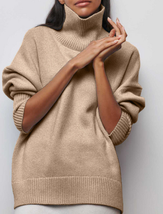 Women’s Iris turtleneck sweater in autumn style by Christine Brewer, featuring a cozy knit with a high neckline and long sleeves.
