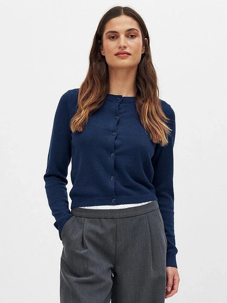 Finley knit cardigan for women by Christine Brewer, shown in a cozy, button-up design with long sleeves and a textured knit pattern.