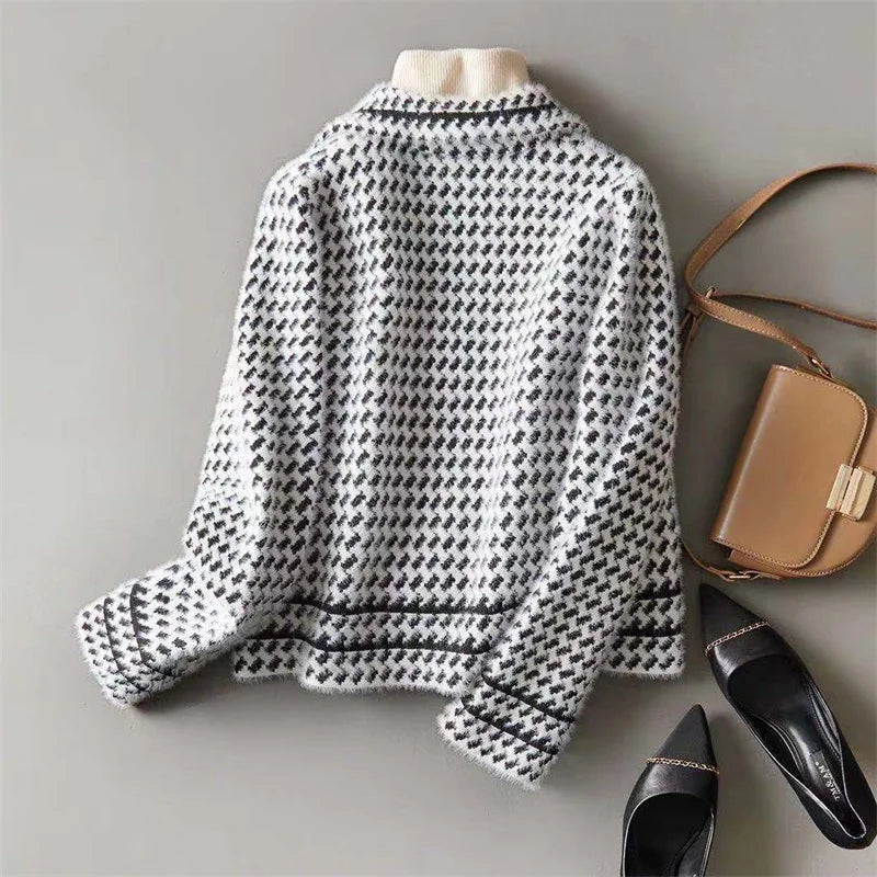 Isabella women's cropped double-breasted knit cardigan by Christine Brewer, featuring a snug fit and stylish button details.