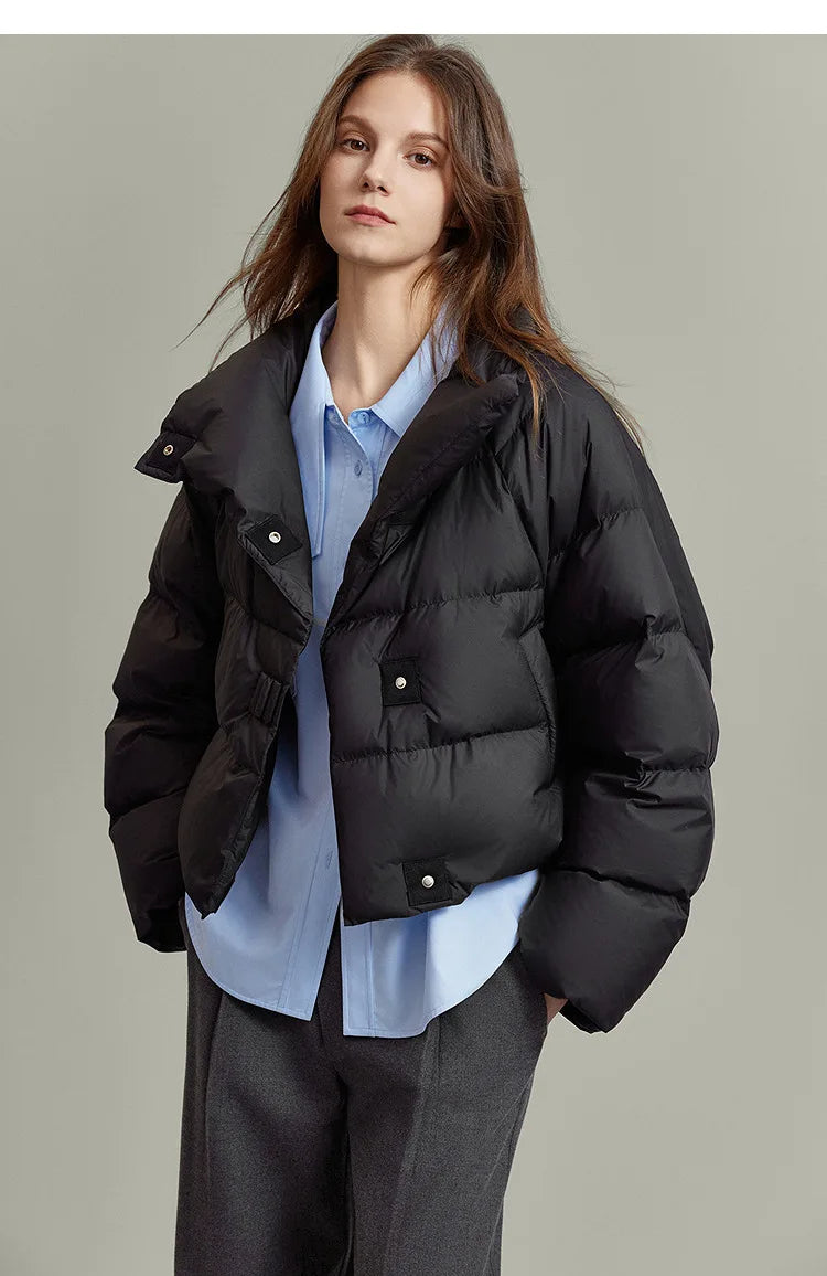 Hannah cropped quilted parka for women by Christine Brewer, showcasing a stylish, insulated outerwear with quilted pattern and hood.