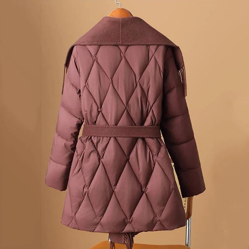 Christine Brewer Stella belted quilted puffer jacket for women, featuring a stylish quilted design and a flattering belt at the waist.