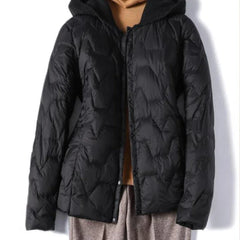 Women’s Zoe quilted puffer jacket with hood by Christine Brewer, featuring a stylish quilted design and warm, insulated fabric.