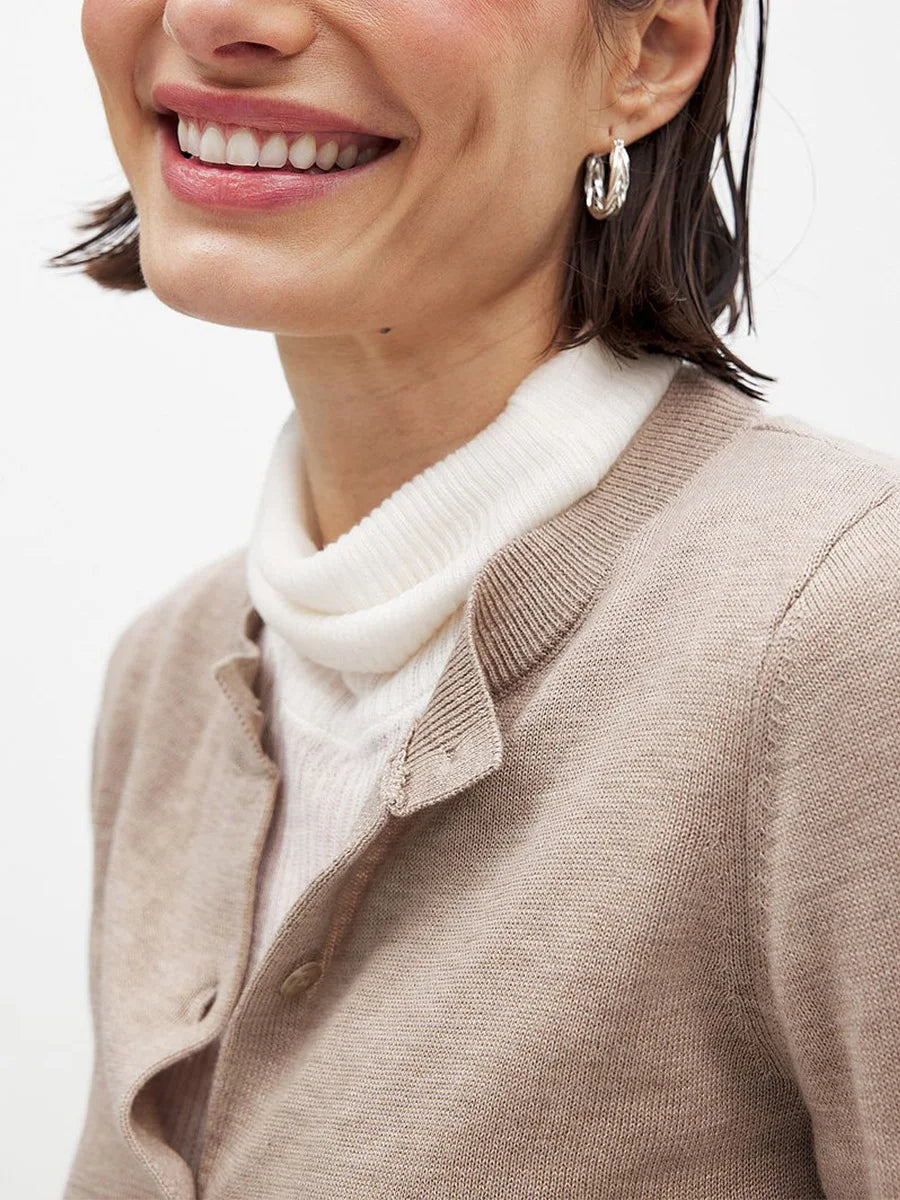 Women’s knit cardigan by Christine Brewer, Finley, featuring a cozy, stylish design with a button-front and ribbed cuffs.