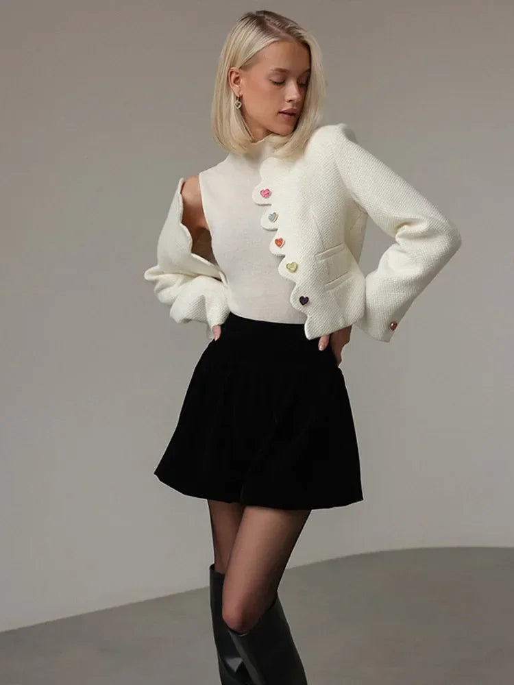 Everleigh cropped button-front women's jacket by Christine Brewer, shown in a stylish, fitted design with front buttons and collar.