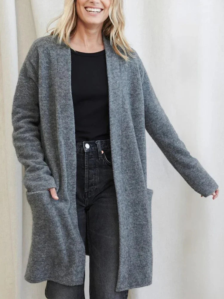 Women’s Jacqueline Merino wool cardigan by Christine Brewer, featuring a cozy, stylish knit design and front button closure.