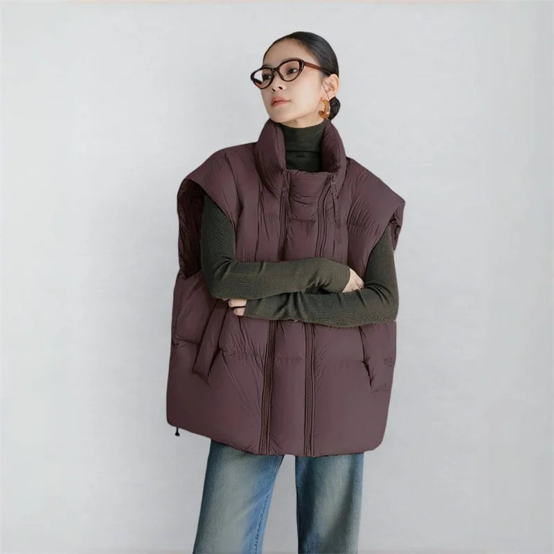 Christine Brewer Layla cropped puffer vest for women, featuring a sleek quilted design and high collar for warmth and style.