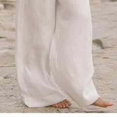 Women’s linen wide-leg trousers by Christine Brewer, loose pull-on pants with relaxed fit, light and breathable fabric.