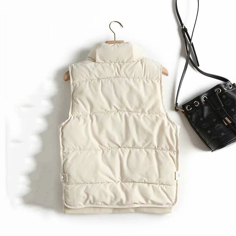 Ruby stand collar puffer vest for women by Christine Brewer, featuring a quilted design and lightweight insulation.