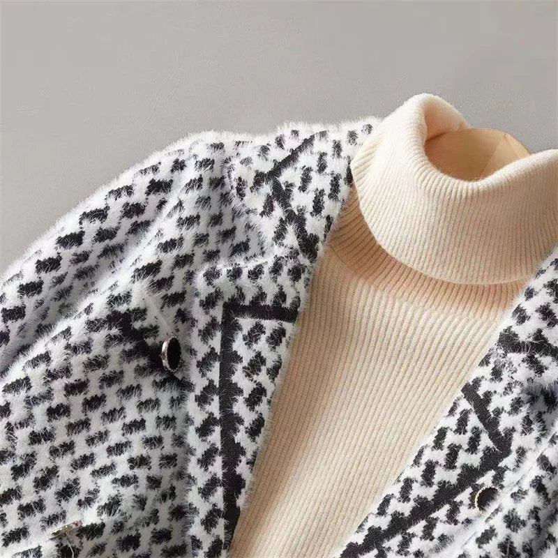 Isabella Christine Brewer cropped double-breasted knit cardigan for women, showing the fitted design and button details.