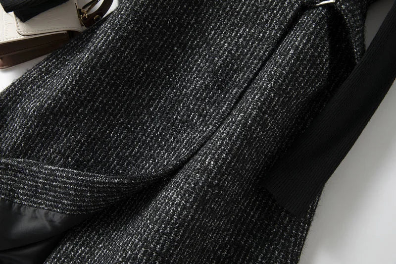 Longline tweed coat for women by Christine Brewer featuring a belted design and classic style in a textured fabric.