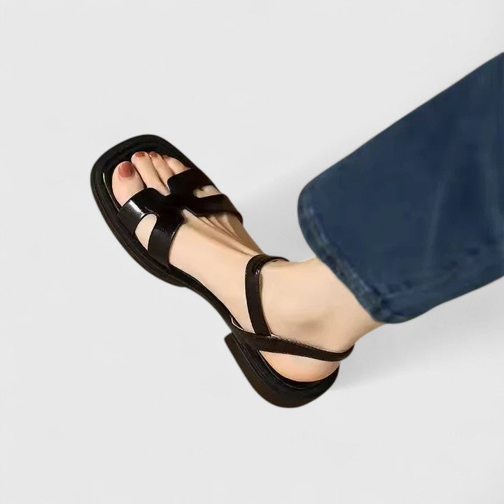 Deliane Christine Brewer women's orthopedic flat sandals with comfortable straps, stylish design, and cushioned sole for everyday wear.