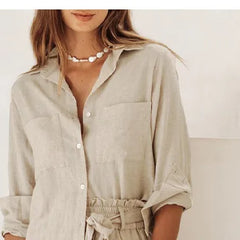 Women’s linen wide-leg trousers by Christine Brewer, loose pull-on pants with relaxed fit and flowing fabric, displayed on a model.