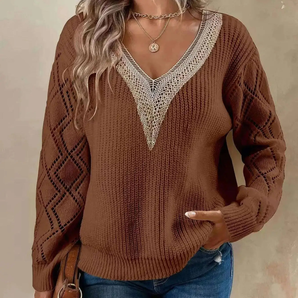 Beige V-neck sweater for women from Christine Brewer Jenna collection, featuring a cozy knit and stylish fit.