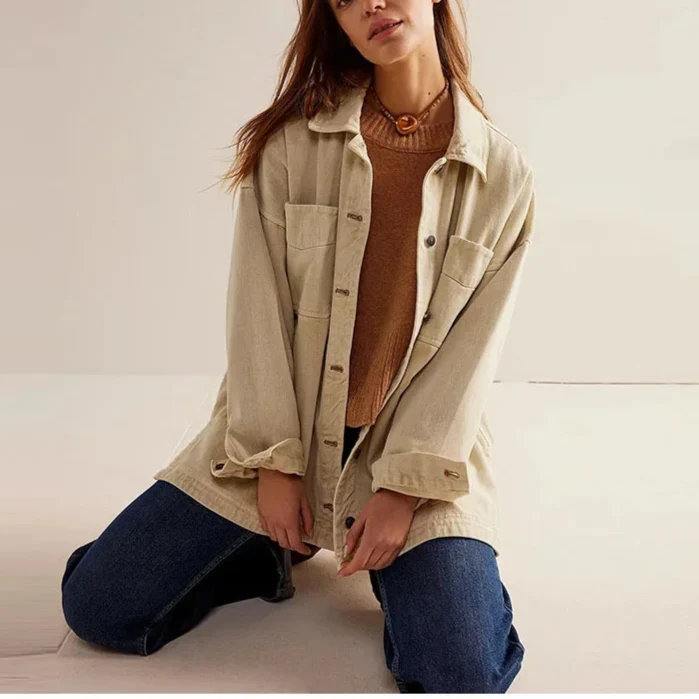 Oversized Charlotte denim shirt jacket for women by Christine Brewer, featuring classic blue denim and relaxed fit.