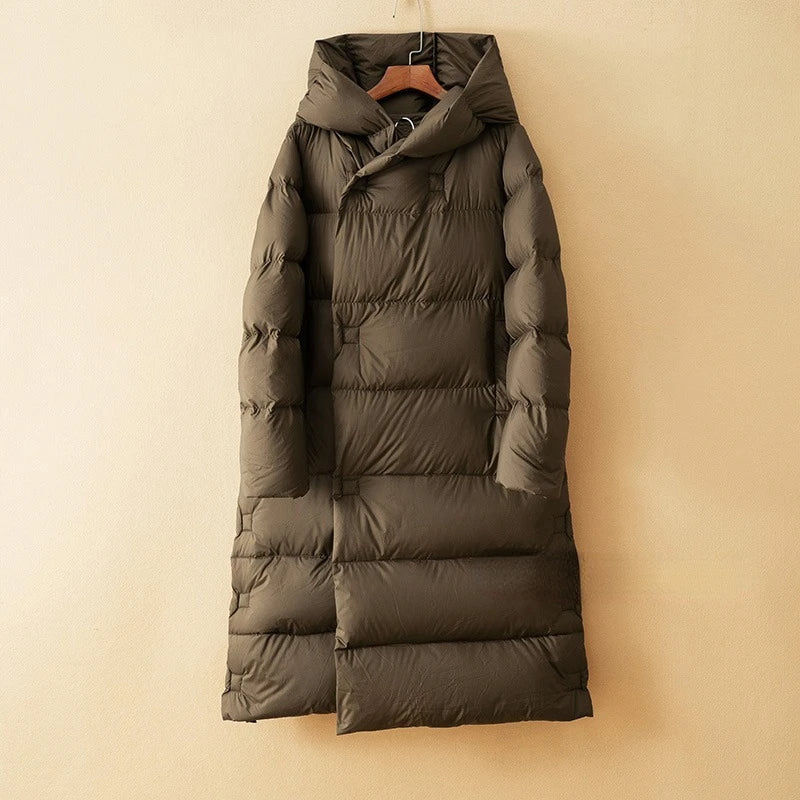 Long hooded parka for women from Christine Brewer, featuring a versatile design with a hood and warm, stylish outerwear.