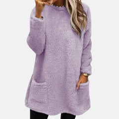 Christine Brewer Estelle knit sweater for women, soft beige sweater with a cozy fit and ribbed cuffs, styled on a model.
