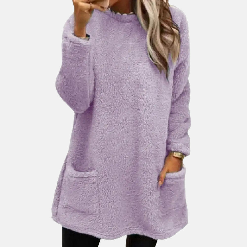 Christine Brewer Estelle knit sweater for women, soft beige sweater with a cozy fit and ribbed cuffs, styled on a model.