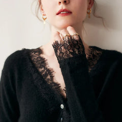 Elsa cashmere cardigan for women by Christine Brewer, soft beige knit with a relaxed fit and button-front design.