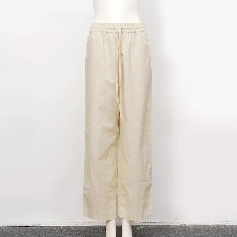 Women’s cotton linen wide-leg drawstring trousers by Christine Brewer, loose pull-on pants with relaxed fit and comfortable design.