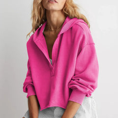 Women’s cropped hoodie from Christine Brewer’s Eleanor collection, featuring a stylish, comfortable design in a neutral color.