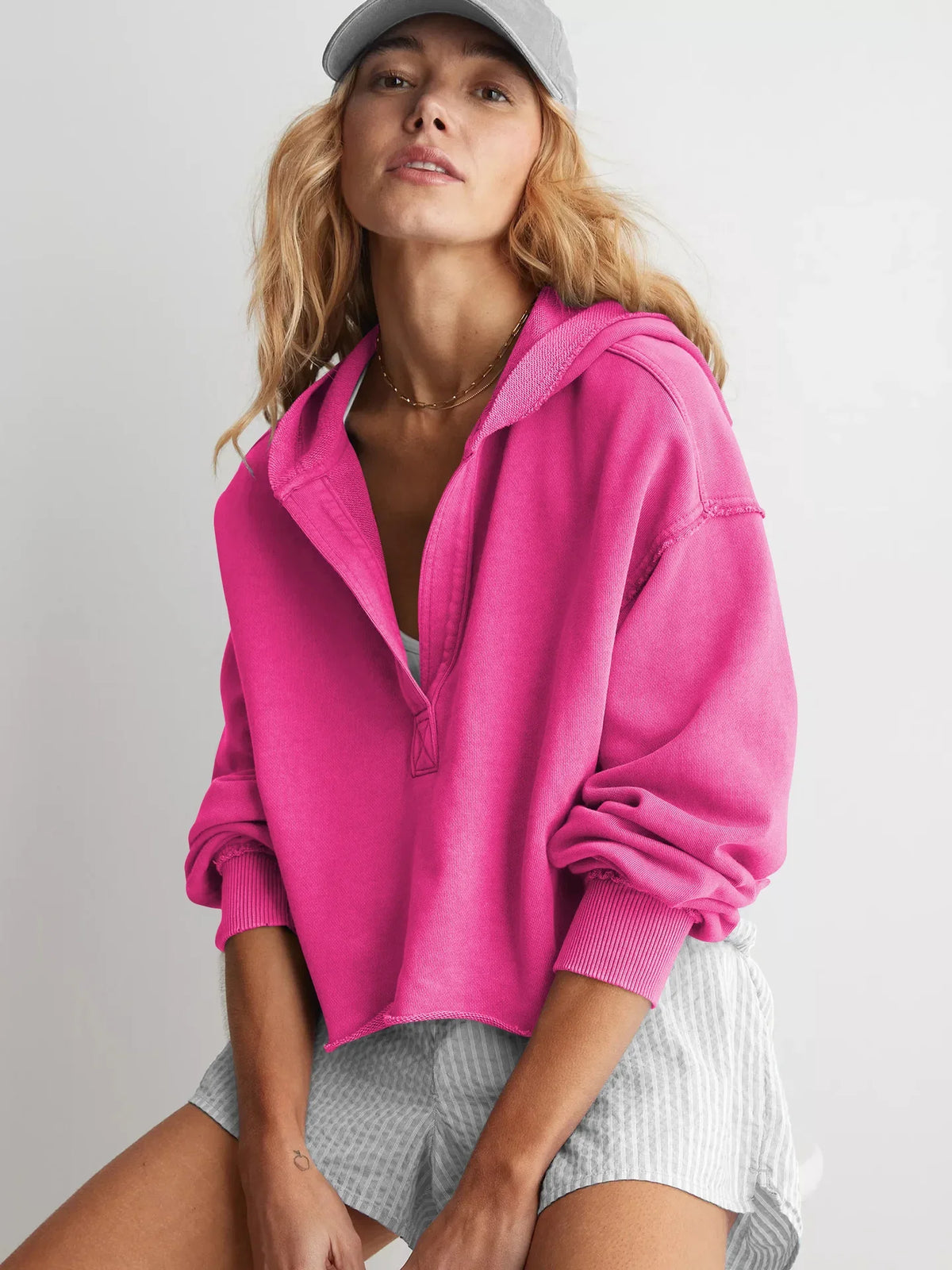 Women’s cropped hoodie from Christine Brewer’s Eleanor collection, featuring a stylish, comfortable design in a neutral color.