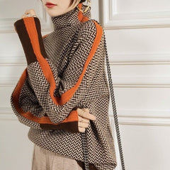 Christine Brewer Sofia turtleneck sweater for women, featuring a cozy knit design with a fitted silhouette and ribbed collar.