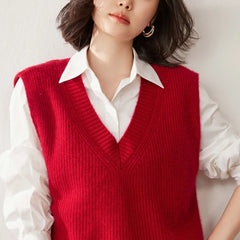Cashmere ribbed knit sweater vest for women by Christine Brewer, featuring a stylish and cozy design in neutral tones.