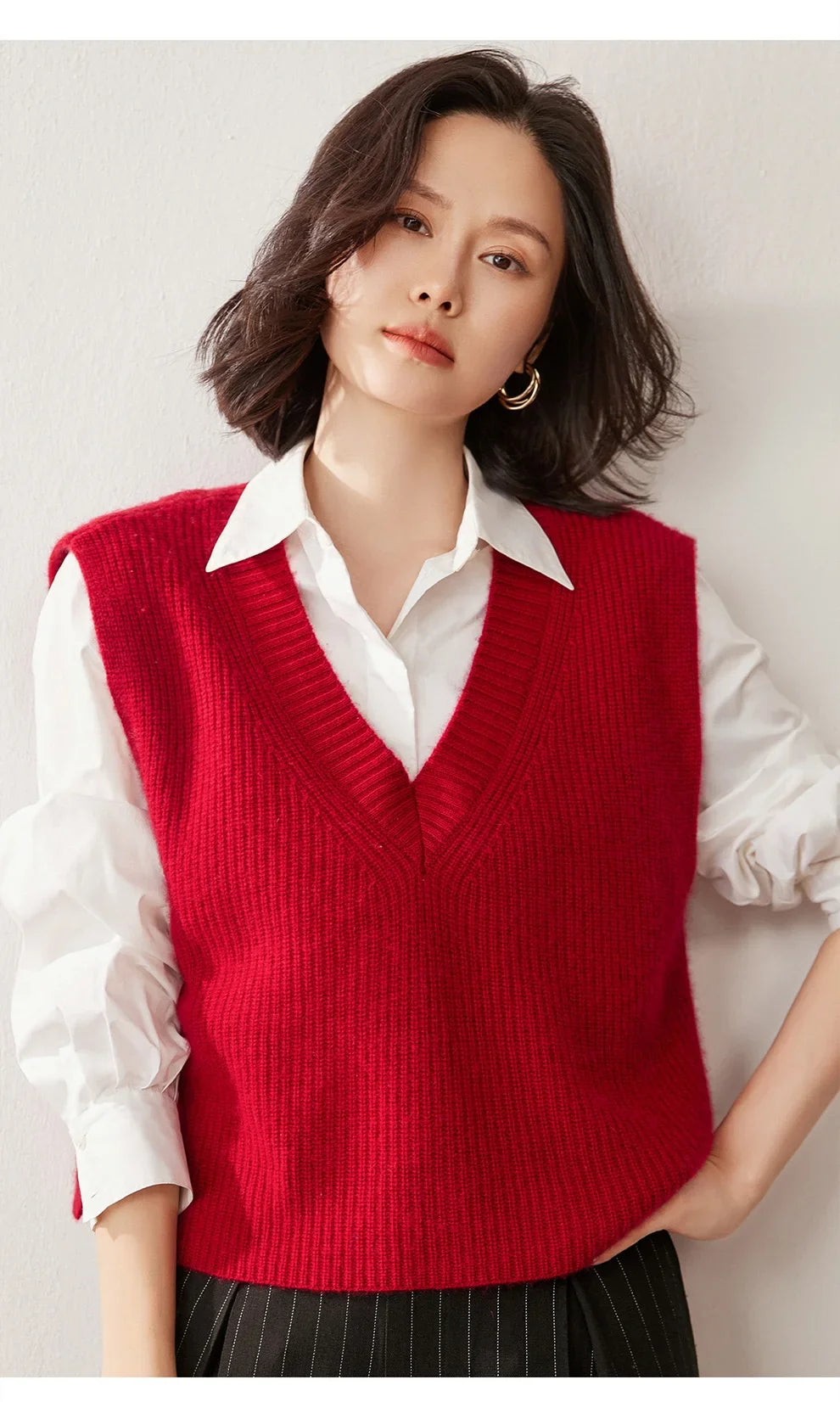 Cashmere ribbed knit sweater vest for women by Christine Brewer, featuring a stylish and cozy design in neutral tones.