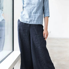 Light beige linen cropped wide-leg drawstring pants for women with a loose fit and comfortable pull-on style by Christine Brewer