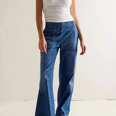 Blue denim wide-leg women's jeans by Christine Brewer, relaxed fit pants with a stylish casual look.