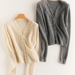 Elsa cashmere cardigan for women by Christine Brewer, soft beige knit sweater with a relaxed fit and button closure.