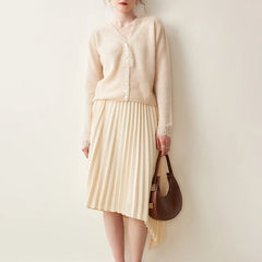 Elegant Elsa cashmere cardigan for women by Christine Brewer, soft knit with a classic fit and cozy neckline.