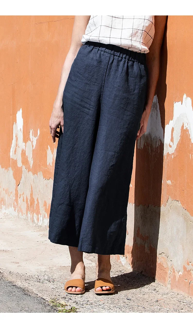 Women’s linen cropped wide-leg drawstring trousers by Christine Brewer, loose pull-on pants with relaxed fit and comfortable style.