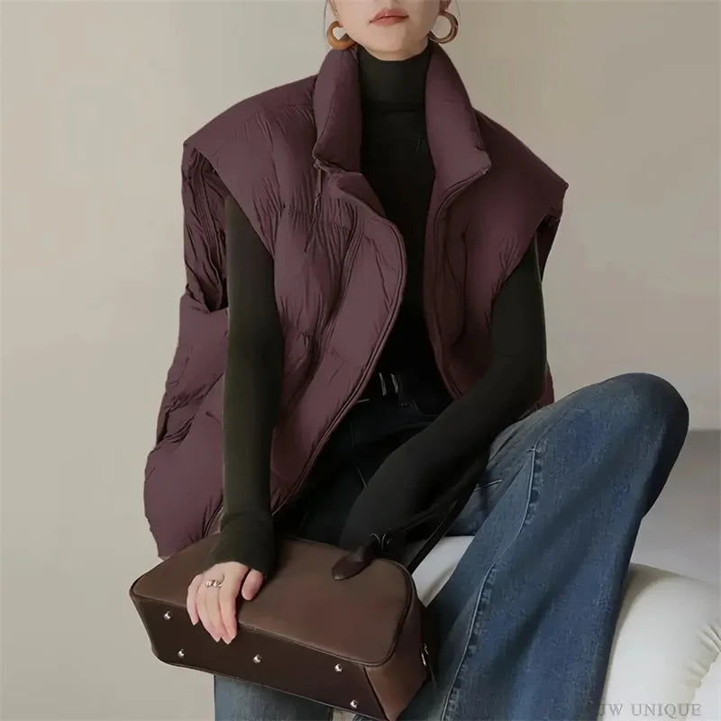 Christine Brewer Layla cropped puffer vest for women, black, lightweight quilted design, front zipper, stylish and cozy winter outerwear.