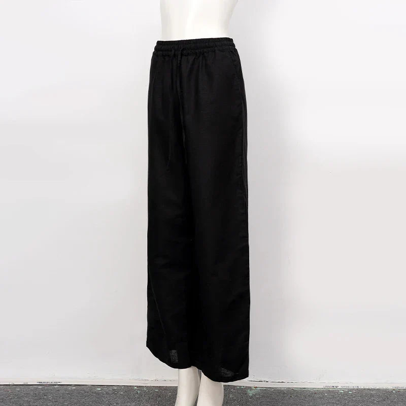 Women’s cotton linen wide-leg drawstring trousers by Christine Brewer, loose pull-on pants with relaxed fit and comfortable waistband.