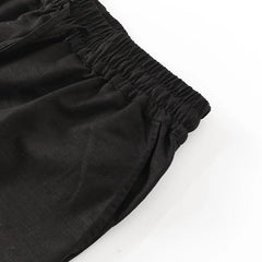 Women’s cotton linen wide-leg drawstring trousers by Christine Brewer, loose pull-on pants with relaxed fit and comfortable style.