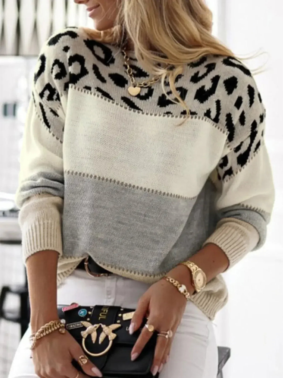 Leopard print graphic sweater for women by Christine Brewer, featuring a stylish and cozy design with bold animal print.
